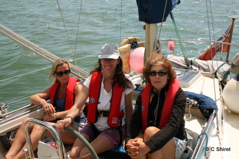 three girls on a boat
